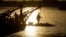 FILE - A passenger stands on the foredeck of a ferry as it crosses the Mekong river from Arey Ksat to the main city of in Phnom Penh, Cambodia. analysts say the U.S. decision to withdraw from the Paris agreement may have wide ranging ramifications for the Asia Pacific.