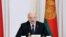 Belarus President Alexander Lukashenko speaks during a cabinet meeting in Minsk, Belarus, July 23, 2021. Belarusian authorities have ramped up raids and arrests of independent journalists and civil society activists in recent weeks.