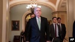 Senate Majority Leader Mitch McConnell leaves the Senate chamber after criticizing the House Democrats' effort to impeach President Donald Trump, Dec. 17, 2019.