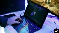 FILE - In this Jan. 7, 2016 file photo, a laptop is seen in Las Vegas. 