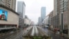 FILE - A street view after the Wuhan government announced to ban nonessential vehicles in a downtown area to contain the coronavirus outbreak, on the second day of the Chinese Lunar New Year, in Wuhan, Hubei province, China, Jan. 26, 2020.