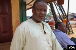 Rahama Atthir Abdoulaye is pictured outside his bakery in Bangui, Central African Republic, Dec. 1, 2015. (C. Stein/VOA)