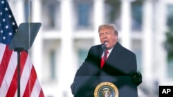 រូបឯកសារ៖ អតីត​ប្រធានាធិបតី​សហរដ្ឋ​អាមេរិក លោក Donald Trump ថ្លែង​ក្នុង​អំឡុង​ពេល​នៃ​ការ​ជួបជុំ​ក្រុម​អ្នក​គាំទ្រ​លោក​នៅ​រដ្ឋធានី​វ៉ាស៊ីនតោន ថ្ងៃទី៦ ខែមករា ឆ្នាំ២០២១។ (AP Photo/Evan Vucci, File)