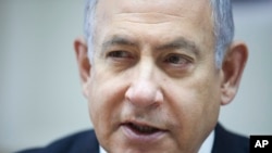 Israeli Prime Minister Benjamin Netanyahu chairs the weekly cabinet meeting at his office in Jerusalem, June. 30, 2019.