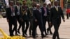 Sudan's President Omar al-Bashir (C) attends the swearing-in ceremony of Uganda's President Yoweri Museveni as newly elected President in Kampala on May 12, 2016.