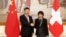 Swiss President Doris Leuthard and China's President Xi Jinping shake hands prior to their talks in Bern, Switzerland, Jan. 16 2017. 