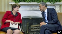 President Barack Obama meets Brazil's President Dilma Rousseff in the Oval Office of the White House in Washington, April 9, 2012.