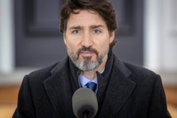 FILE - Canadian Prime Minister Justin Trudeau speaks during a COVID-19 pandemic briefing from Rideau Cottage in Ottawa, Nov. 20, 2020.