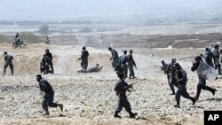 Afghan police open fire on a crowd of Hazara Afghans on the outskirts of Kabul, 13 Aug 2010