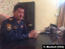 Iraqi Federal Police Colonel Tahssen al-Mohammadawi and several other soldiers say that Islamic State militants hiding out in Mosul's Old City ambushed them, Sept. 30, 2017.