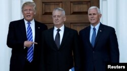 U.S. President-elect Donald Trump (L) and Vice President-elect Mike Pence (R) greet retired Marine General James Mattis in Bedminster, New Jersey, U.S., Nov. 19, 2016.