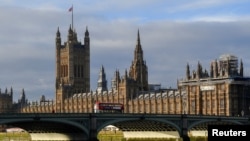 The British union flag flutters on the Victoria Tower at the Houses of Parliament, as Parliament is recalled to ratify legislation confirming Britain’s departure from the European Union, in London, Britain, Dec. 30, 2020. 