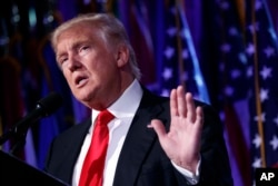 FILE - President-elect Donald Trump speaks during a rally in New York.