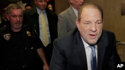 Harvey Weinstein arrives at a Manhattan courthouse as jury deliberations continue in his rape trial, Monday, Feb. 24, 2020, in New York. (AP Photo/Seth Wenig)
