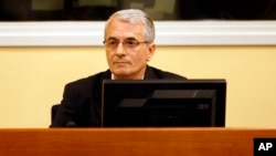 FILE - Bosnian army commander Enver Hadzihasanovic during a 2008 appeal at the International War crimes Tribunal in the Hague, Netherlands