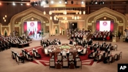 Gulf leaders meet during a Gulf Cooperation Council summit in Doha, Qatar, Dec. 9, 2014.