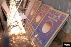 Signs advertising the opposition Cambodia National Rescue Party lie in the dirt at the Chantrey commune police office after being taken down when the party was dissolved in November last year, Feb. 15, 2018. (Sun Narin/VOA Khmer)
