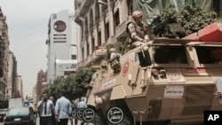 Soldiers guard a street near a church in downtown Cairo, Egypt, April 10, 2017, following Palm Sunday bombings in churches in Tanta and Alexandria that killed 45 Coptic Christians.