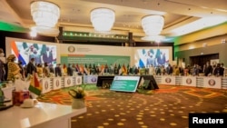Leaders from the Economic Community of West African States (ECOWAS) hold an extraordinary summit to discuss the situation in in Mali, in Accra, Ghana, Jan. 9, 2022. (Ange Servais Mahouena/Ivory Coast Presidential Press Service/Handout via Reuters)