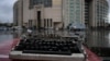 FILE - A broken typewriter is symbolically displayed outside Istanbul's courthouse during the trial of a journalist on charges of supporting Kurdish militants, Sept. 30, 2021. At least six Kurdish journalists have been detained in Turkey so far in January 2025.