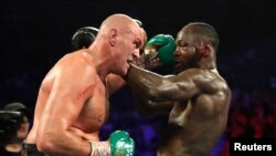 Deontay Wilder et Tyson Fury lors d'un match à Las Vegas, USA, le 22 février 2020 REUTERS/Steve Marcus