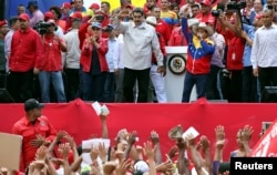 Venezuela's President Nicolas Maduro attends a rally in support of his government in Caracas, April 6, 2019.