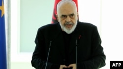 FILE - Albania's Prime Minister Edi Rama speaks at a press conference at the port of Shengjin, some 60 km northwest of Tirana, Albania, June 5, 2024. 