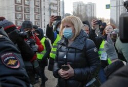Olga Mikhailova, lawyer of Kremlin critic Alexey Navalny, arrives at a court building before a hearing to consider the case against Navalny for the suspected slander of a Russian World War Two veteran in Moscow, Russia Feb. 5, 2021.