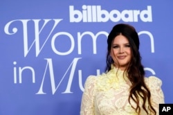 FILE - Honoree Lana del Rey poses at the 2023 Billboard Women in Music Awards, Wednesday, March 1, 2023, at YouTube Theater in Inglewood, Calif. (AP Photo/Chris Pizzello)