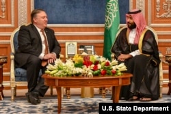 FILE - Secretary of State Mike Pompeo meets with Saudi Crown Prince Mohammed bin Salman to discuss the disappearance of Saudi journalist and dissident Jamal Khashoggi, in Riyadh, Saudi Arabia, Oct. 16, 2018.