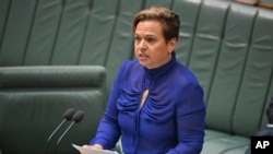 Australia's Minister for Communications, Michelle Rowland, introduces the Online Safety Amendment Bill in the House of Representatives at Parliament House in Canberra, Nov. 21, 2024.