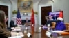 President Joe Biden meets virtually with Chinese President Xi Jinping from the Roosevelt Room of the White House in Washington, Nov. 15, 2021.