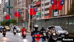 Taiwan flags can be seen in the streets in Taipei City, Taiwan, Jan. 3, 2024.