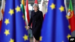 British Prime Minister Theresa May arrives for an EU summit at the Europa building in Brussels, Belgium, Dec. 14, 2017. 