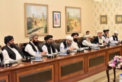 Mullah Abdul Ghani Baradar (3rd-L), who is leading a Taliban delegation, attends a meeting at the Ministry of Foreign Affairs in Islamabad, Pakistan, Oct. 3, 2019.