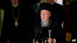 Ecumenical Patriarch Bartholomew I, the spiritual leader of the world's Orthodox Christians, talks to reporters outside the West Wing of the White House in Washington, Oct. 25, 2021, following his meeting with President Joe Biden. 