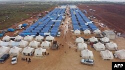 A new camp for internally displaced people is shown near Maarrat Misrin, in Syria's Idlib province. An estimated 170,000 of the 900,000 civilians forced from their homes in northwestern Syria are living out in the open, the U.N. says.