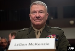 FILE - Then-Lt. Gen. Kenneth F. McKenzie testifies during a Senate Armed Services Committee hearing on Capitol Hill in Washington, Dec. 4, 2018.