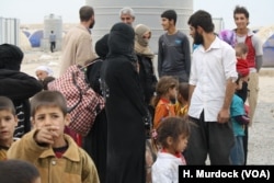 Groups of 20 to 40 people are arriving a few times a day or night, according to Peshmerga soldiers in the Khazir Camp in the Kurdish region of northern Iraq, Oct. 28, 2016.