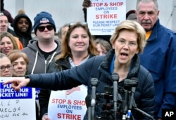 FILE - Sen. Elizabeth Warren, D-Mass., speaks after she joined striking Stop & Shop supermarket employees on the picket line, April 12, 2019, in Somerville, Mass.