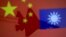 FILE - Chinese and Taiwanese flags are displayed alongside a military airplane in this illustration made April 9, 2021.