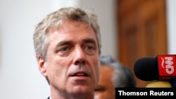FILE - German ambassador to Venezuela Daniel Martin Kriener holds a news conference in Caracas, Venezuela, Feb. 19, 2019.