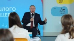 Russian President Vladimir Putin meets with teenagers to mark the start of the new school year in the Russian far eastern city of Vladivostok on Sept. 1, 2021. (Sputnik via AFP)