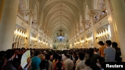 FILE - In this undated photo, Catholics pack Citeaux Chau Son abbey in Vietnam's Ninh Binh province. Late last year, the U.S. put Vietnam on a Special Watch List for being a country that "engaged in or tolerated severe violations of religious freedom during the previous year."