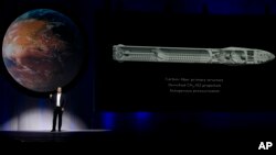 SpaceX founder Elon Musk tells the 67th International Astronautical Congress in Guadalajara, Mexico, that he envisions 1,000 passenger ships flying en masse to Mars and says it could become reality within a century, Sept. 27, 2016.