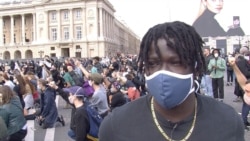 Fidel Nzenzi, pictured near the U.S. Embassy in Paris, says he&#39;s protesting against inequality and racism in France. (Lisa Bryant/VOA)