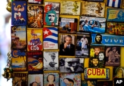 Refrigerator magnets are displayed for sale in a tourist shop, several showing images of U.S. President Barack Obama, at a market in Havana, Cuba, March 14, 2016. Obama will travel to Cuba on March 20.
