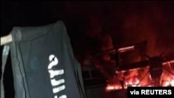 FILE - Al-Shabab's flag is seen in this image distributed by the Somalia militant group, Jan. 5, 2020. 