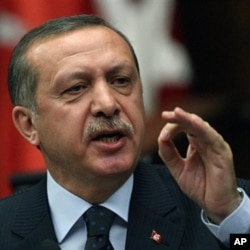 Turkish PM Recep Tayyip Erdogan addresses his lawmakers at the parliament in Ankara, June 1, 2010, a day after Israeli naval commandos stormed a flotilla of ships carrying aid and hundreds of international peace activists to the blockaded Gaza Strip on Mo