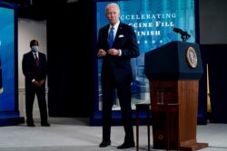 President Joe Biden leaves an event with Johnson and Johnson Chairman and CEO Alex Gorsky, in the Eisenhower Executive Office Building on the White House Campus, March 10, 2021, in Washington.